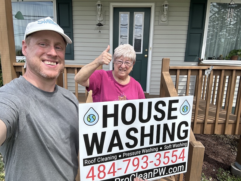 ProClean Power Washing Owner Ryan with Happy Customer